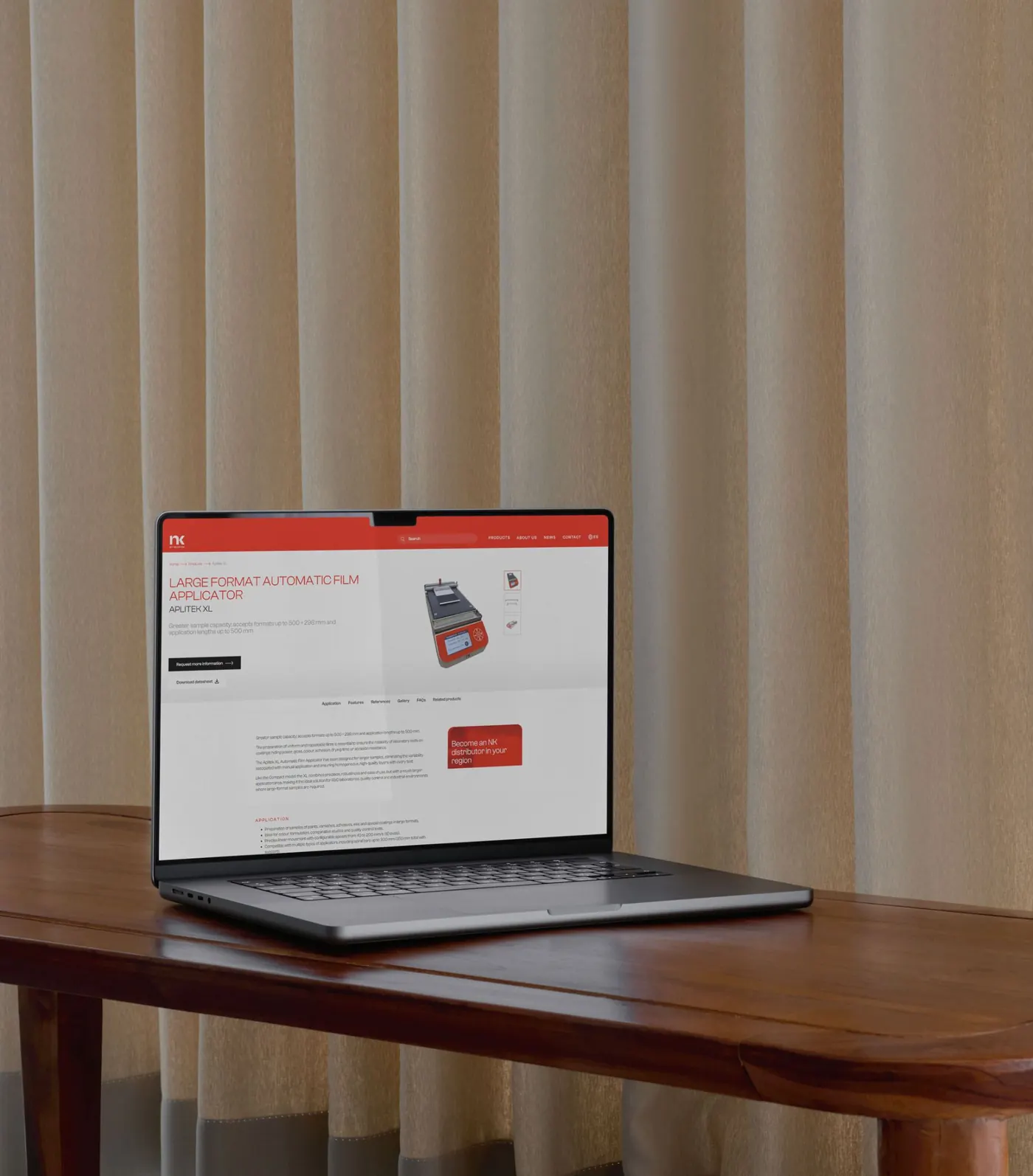 Product page for the Aplitek XL film applicator on the NK website, seen on a laptop